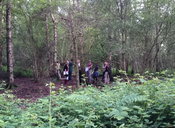 the group standing in Holywell Park, a predominantly Ash Forest on Loughborough University's campus